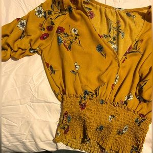 Cute light crop top, yellow with flowers, size large.